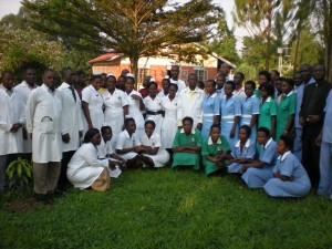 ST.AMBROSE STAFF POSE FOR A PHOTO IN THE COMPOUND
