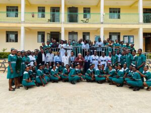 Set 5 class, the staff St. Ambrose having a pictorial moment with Mr. Thomas L Portland